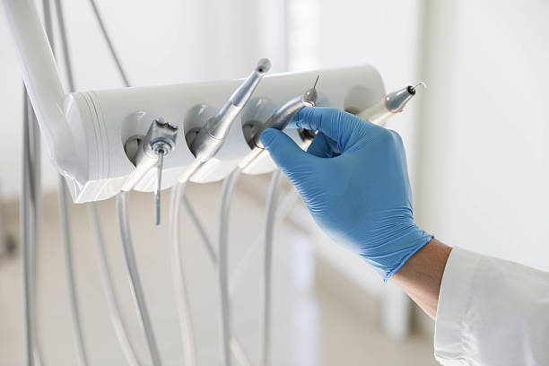Professional Invisalign Clear Aligners technician working in Pinehurst, TX